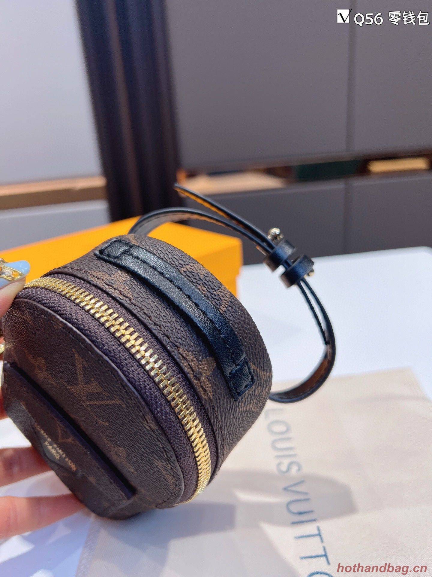 Louis Vuitton Monogram Canvas Mini Wrist Bag M12587 Louis Vuitton Monogram Canvas Mini Wrist Bag M12587