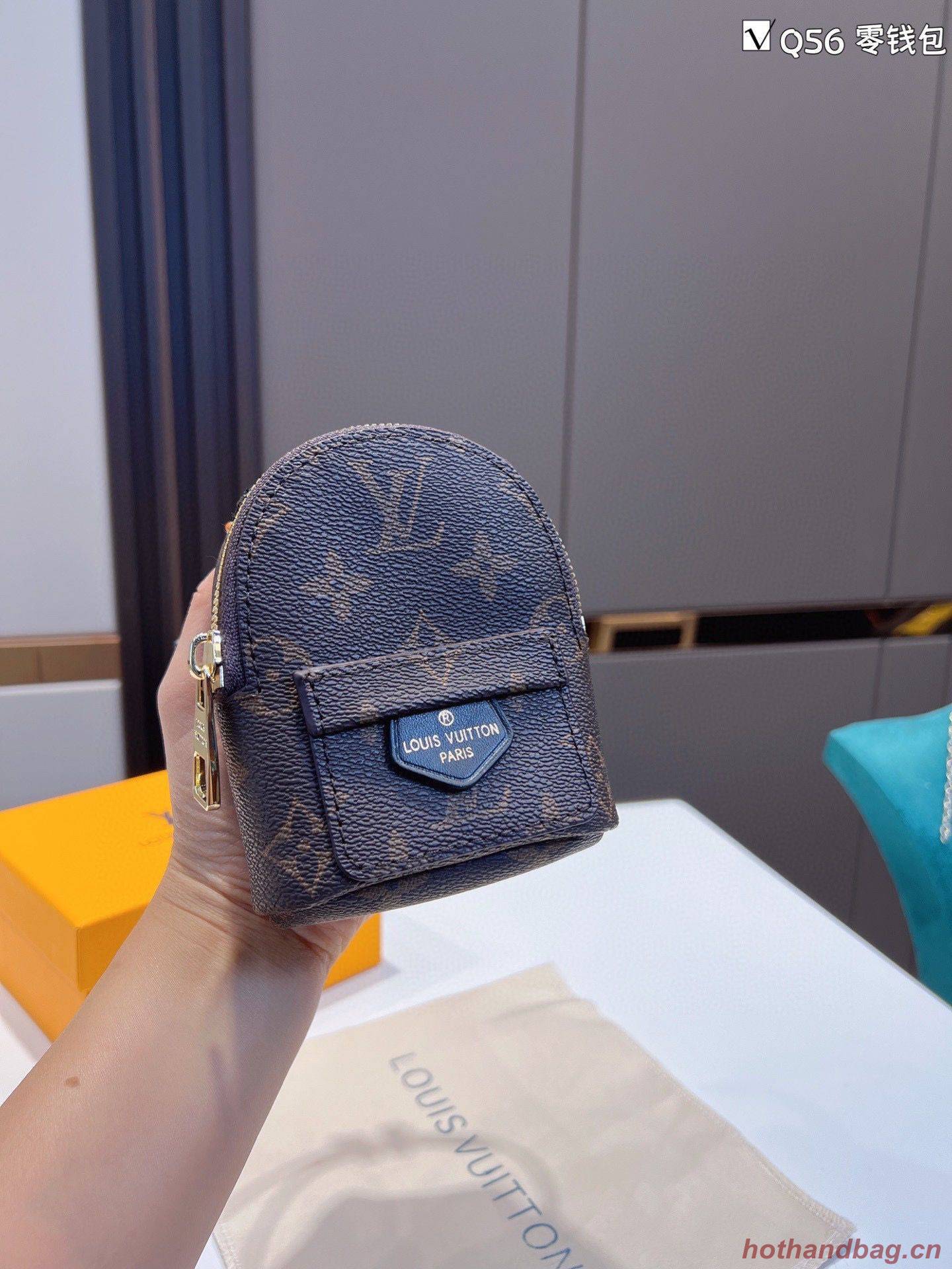 Louis Vuitton Monogram Canvas Mini Wrist Bag M12587 Louis Vuitton Monogram Canvas Mini Wrist Bag M12587