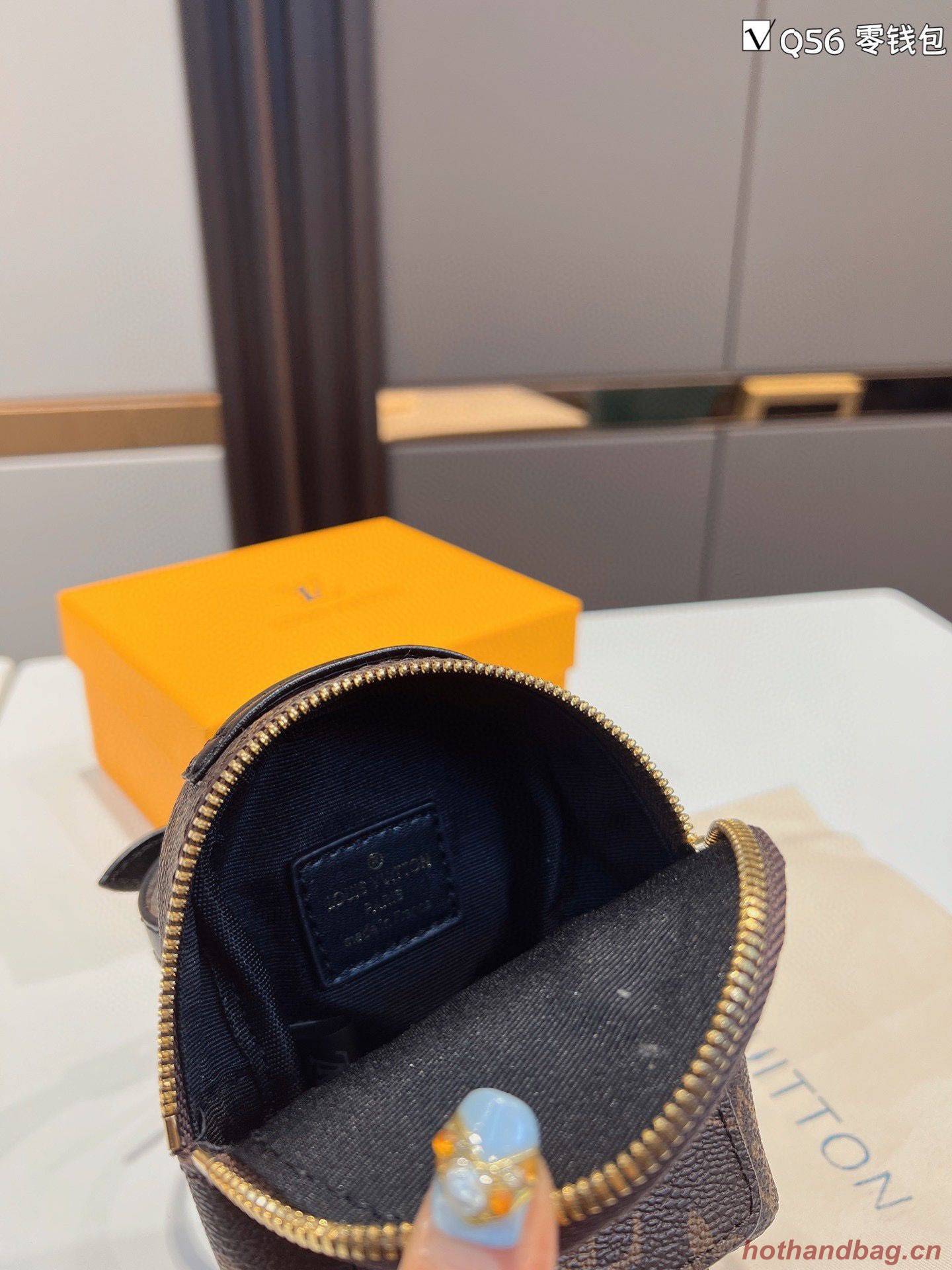 Louis Vuitton Monogram Canvas Mini Wrist Bag M12587 Louis Vuitton Monogram Canvas Mini Wrist Bag M12587